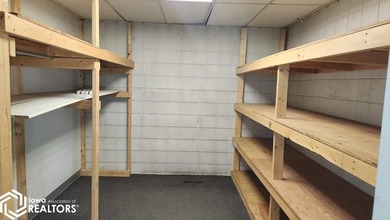 Former equipment dealership building on 1.27 acres at the west