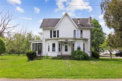 A well loved, character-filled village home tucked along a quiet - photo 1