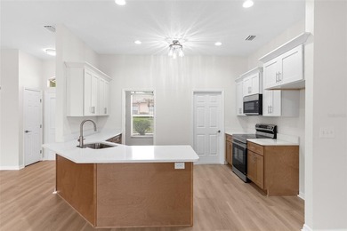This remodeled 3/2 single-family residence offers comfort - photo 12