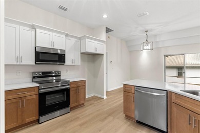 This remodeled 3/2 single-family residence offers comfort - photo 13