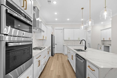 Don't miss this exceptional new construction home in the highly - photo 22