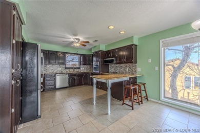 This isn't your typical lake condo-step inside and you'll feel