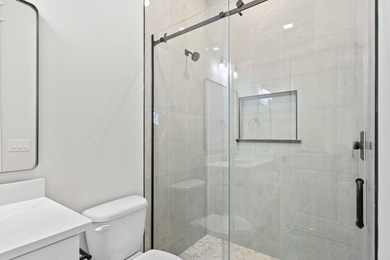 Don't miss this exceptional new construction home in the highly - photo 44