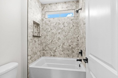 Don't miss this exceptional new construction home in the highly - photo 52