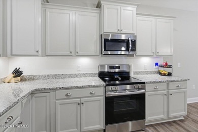 Welcome home! This well-kept two-story home features a bright