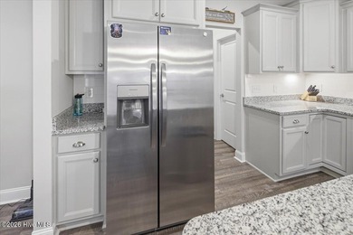 Welcome home! This well-kept two-story home features a bright