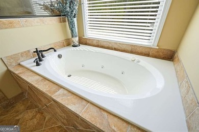 Welcome home to this move-in-ready 5BR/4BA custom home in the - photo 15