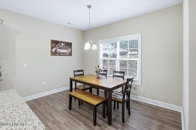 Welcome home! This well-kept two-story home features a bright