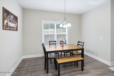 Welcome home! This well-kept two-story home features a bright