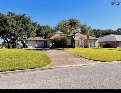 Updated 3 bedroom, 2 bath Country Club home on a corner lot! The - photo 2