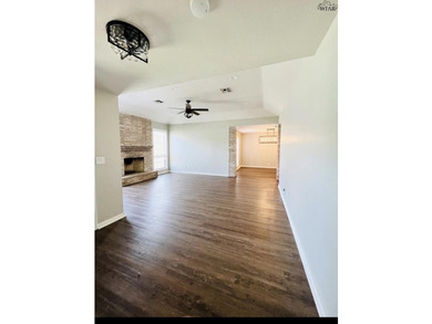 Updated 3 bedroom, 2 bath Country Club home on a corner lot! The - photo 6