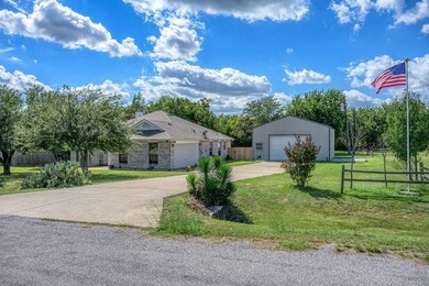 Welcome to this beautiful 3-bedroom, 2-bath, brick home that - photo 2