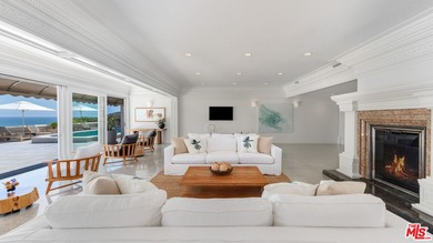 Experience palatial elegance and abundant natural light in this - photo 16