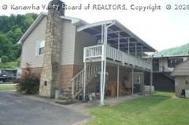 4- bedroom 2 bath mid-entry home with ground level entries front - photo 2