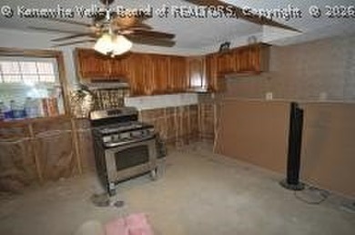 4- bedroom 2 bath mid-entry home with ground level entries front - photo 5