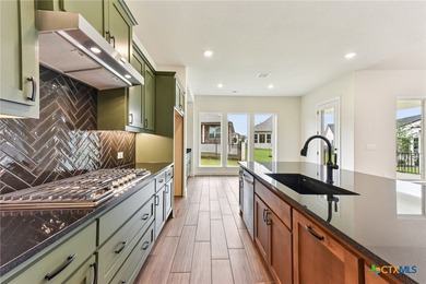Auburn plan with upgraded kitchen, upgraded granite countertops - photo 10