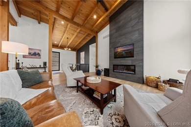 Contemporary luxury meets effortless lake living in this - photo 12