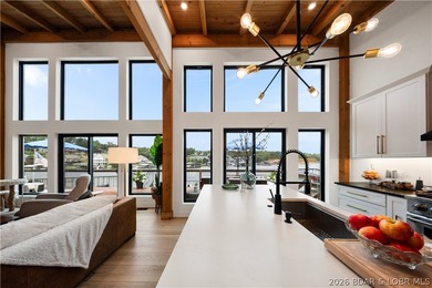 Contemporary luxury meets effortless lake living in this - photo 16
