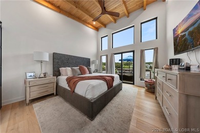 Contemporary luxury meets effortless lake living in this - photo 21