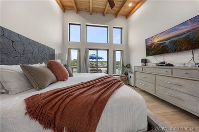 Contemporary luxury meets effortless lake living in this - photo 22