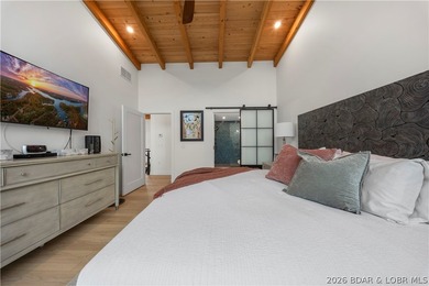 Contemporary luxury meets effortless lake living in this - photo 23