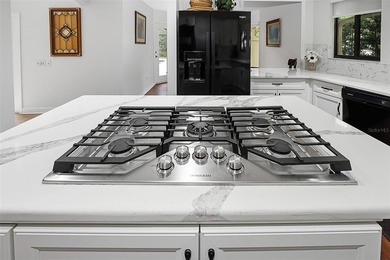 Custom-Built Brick Beauty in Breakaway Trails! Tucked away on a - photo 31