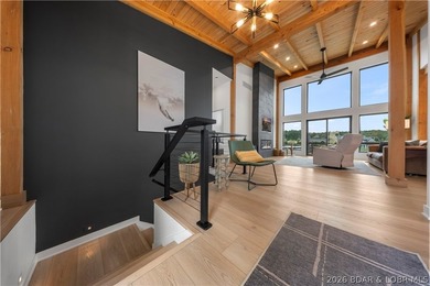 Contemporary luxury meets effortless lake living in this - photo 32