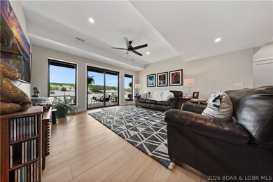 Contemporary luxury meets effortless lake living in this - photo 34
