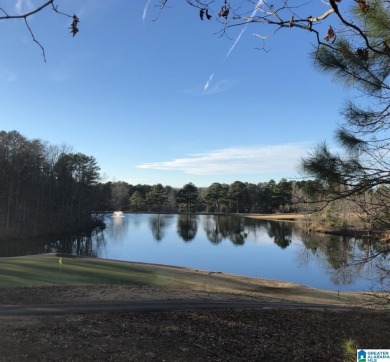 Wooded lot on 18 hole golf course community across the street