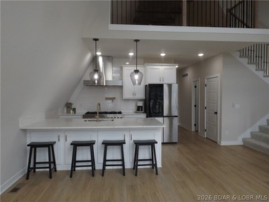 Far from your typical A-frame home, this beautiful 3-bedroom - photo 6