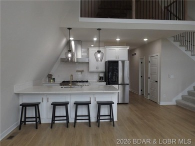 Far from your typical A-frame home, this beautiful 3-bedroom - photo 6