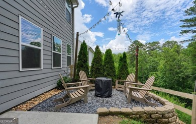 Privacy, peaceful wooded views, and modern construction come - photo 45
