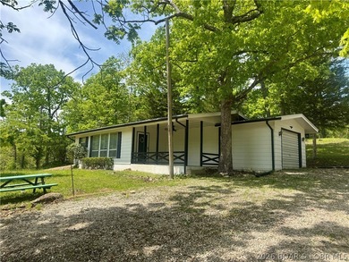 This property is ready for LAKE FUN. This lake access cabin has