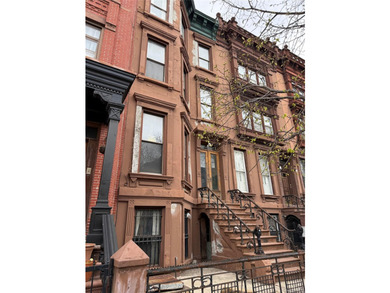 This classic four-story brownstone with beautiful architectural - photo 3