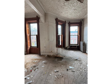This classic four-story brownstone with beautiful architectural - photo 5