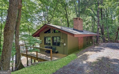 A Rare Lake Lanier Retreat on 4.24 Private Acres in a Deepwater - photo 4