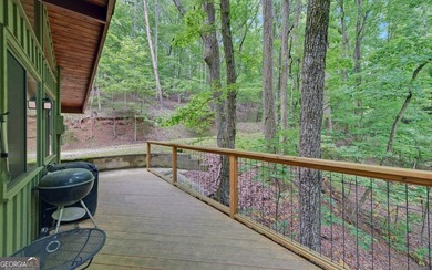 A Rare Lake Lanier Retreat on 4.24 Private Acres in a Deepwater - photo 7