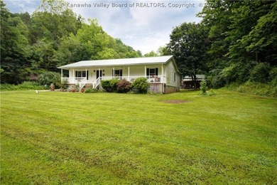 PEACEFUL, PRIVATE COUNTRY SETTING ON 1.2 ACRES IN POCA! THIS - photo 1