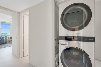 Experience elevated living in this stunning top-floor sanctuary