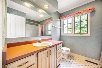 Set on nearly half an acre, this 2 story brick-front Colonial - photo 16