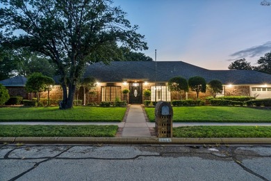 Tucked on a corner lot in Midwestern Park, this 4-bed, 3-bath - photo 1