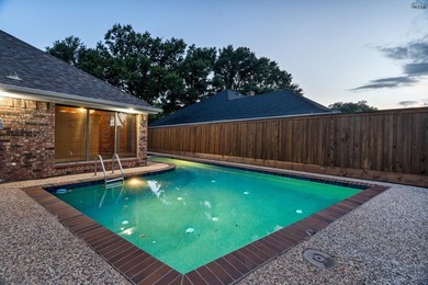 Tucked on a corner lot in Midwestern Park, this 4-bed, 3-bath - photo 4
