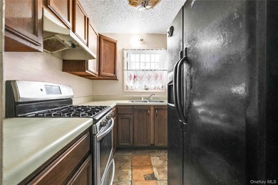 Welcome to 2069 Seward Avenue, a well-maintained two-family home - photo 8