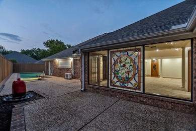 Tucked on a corner lot in Midwestern Park, this 4-bed, 3-bath - photo 8