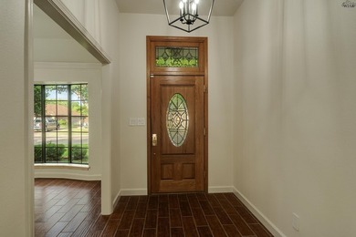 Tucked on a corner lot in Midwestern Park, this 4-bed, 3-bath - photo 9
