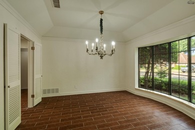 Tucked on a corner lot in Midwestern Park, this 4-bed, 3-bath - photo 10