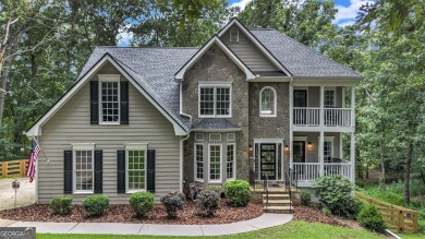 Lake Home For Sale in Flowery Branch, Georgia