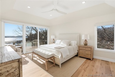 Experience unparalleled lakeside luxury in this fully remodeled - photo 12