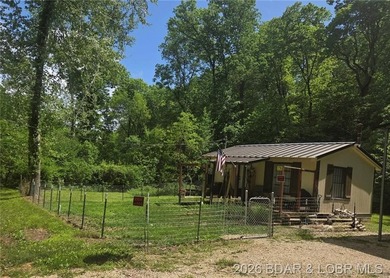 This affordable cabin in the woods is a smart pick for investors - photo 2