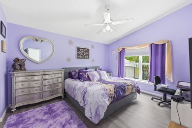 Spacious home with high ceilings and a bright, open layout. The - photo 14